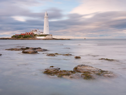 Rocks Rising Through The Tide
